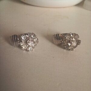 Dainty clip on floral rhinestone earrings. Vintage Avon.